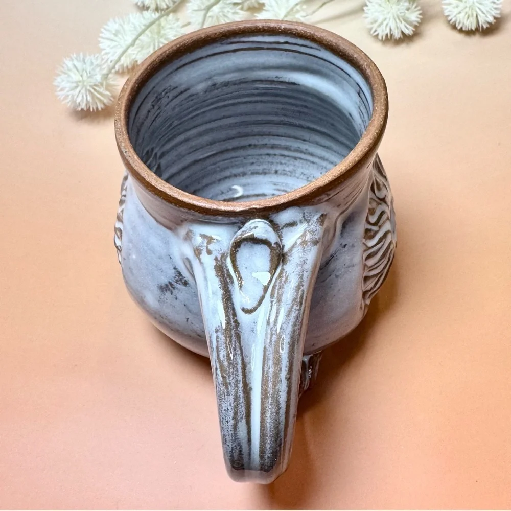 Artist Signed Wheel Spun Pottery mug. Handmade custom piece